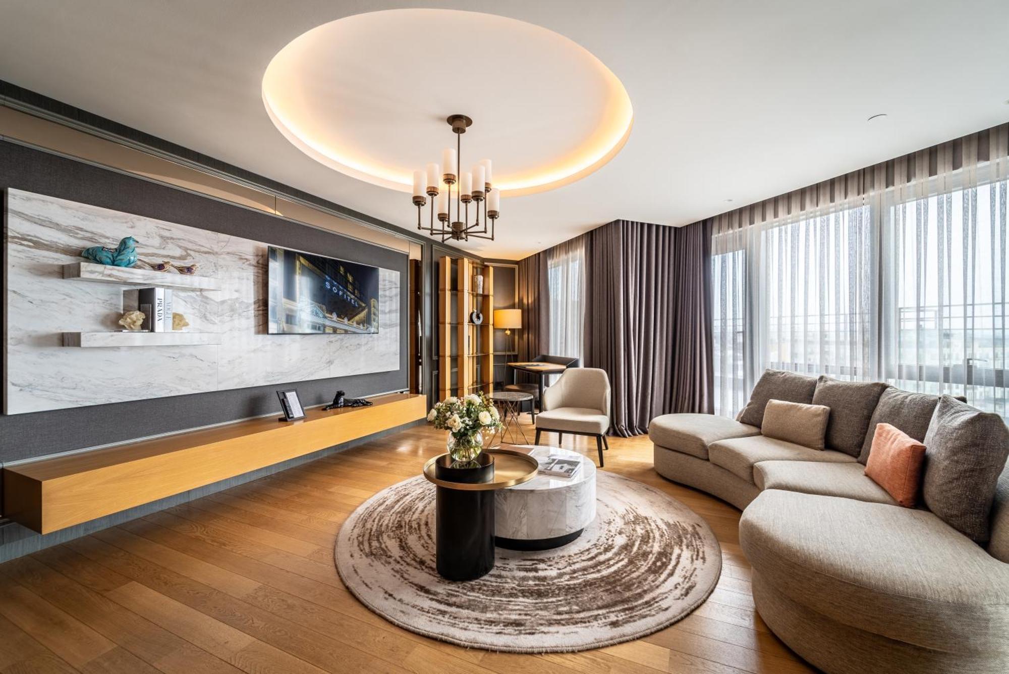 Sofitel Istanbul Taksim Hotel Екстериор снимка A living room in a luxury apartment